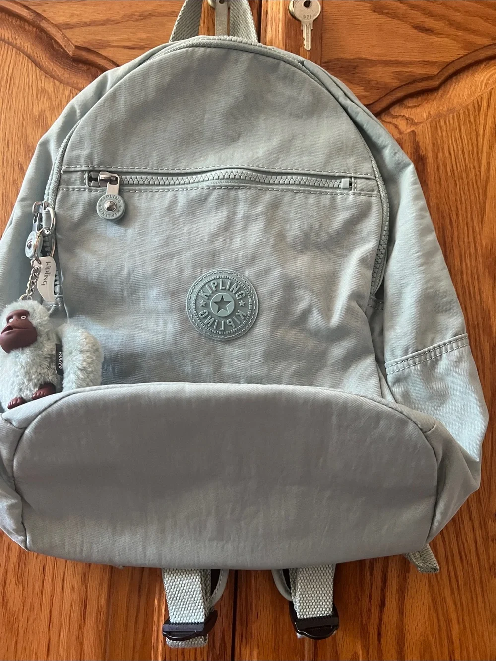 Kipling Light Blue  Backpack with Monkey Keychain